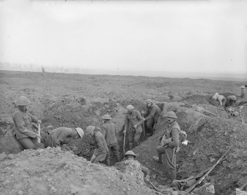 New Zealanders creating a trench by joining up shell craters, near Martinpuich, Battle of Flers-Courcelette. 15 September 1916.
